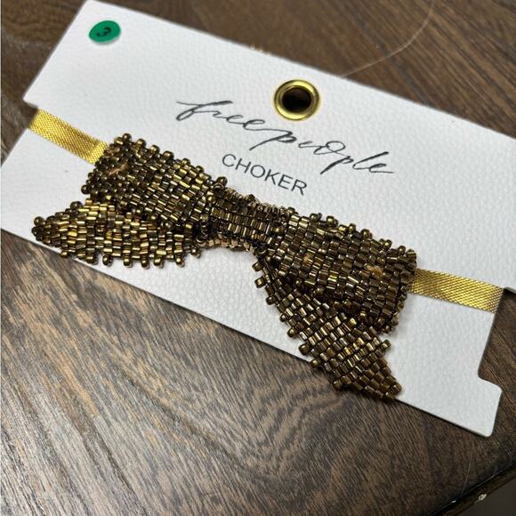 Free People Gold Choker Necklace Chainlink  Bow Detail and Adjustable Back - Picture 2 of 4